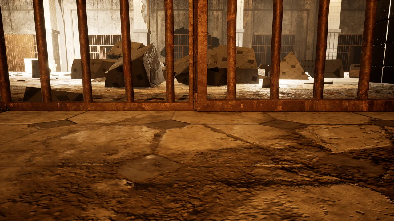 A view through the iron bars of a cell in Block B.